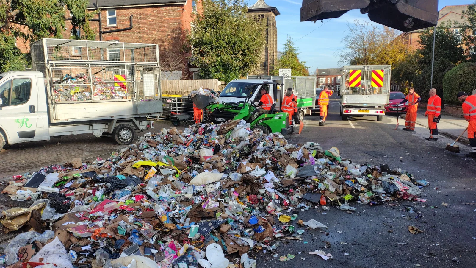 Streetwise crews clearing the dumped load on Patrick Road, West Bridgford, after the fire